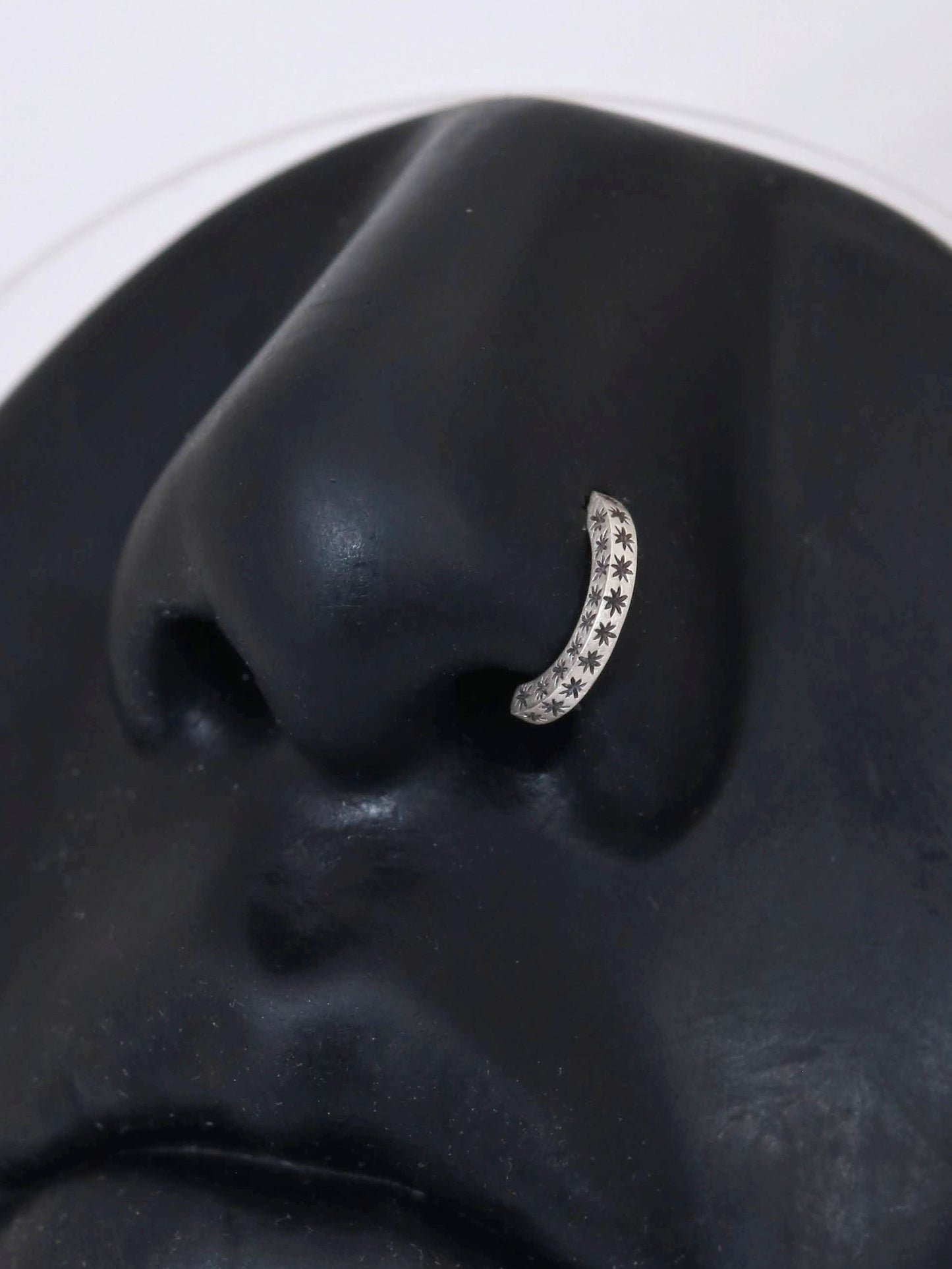 14k gold or sterling silver nose huggie hoop stud illusion hoop nostril jewelry with hand carved stars. Completely handmade by a small business.