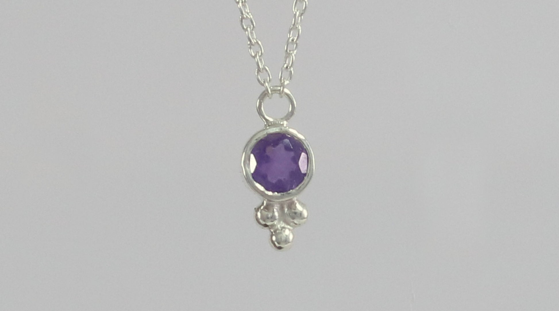 Natural gemstone set in sterling silver bezel, silver bubble pyramid accent on a sterling silver chain.