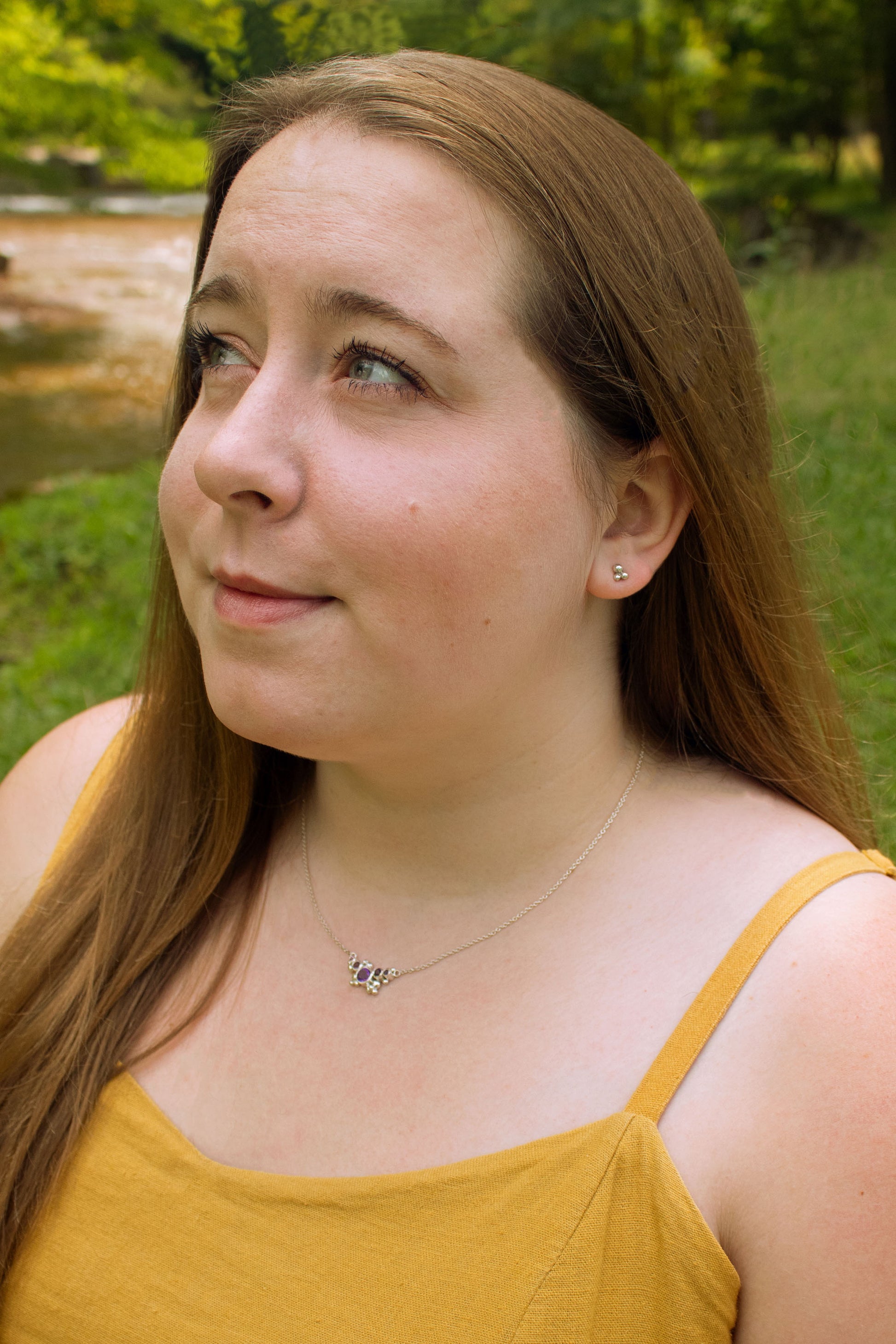Stud earrings with three sterling silver bubbles in a pyramid.