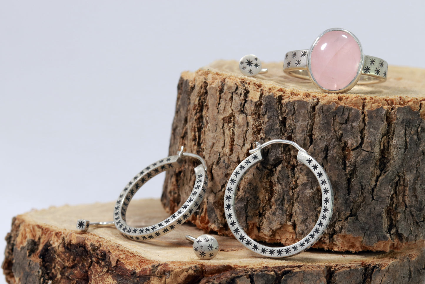 Star hoops, rings and nose rings, all solid sterling silver.