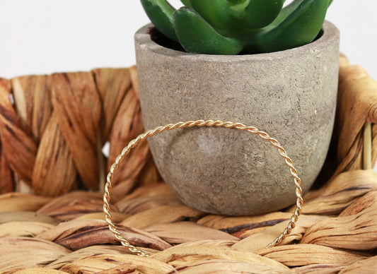 2mm twisted 14k yellow gold cuff.