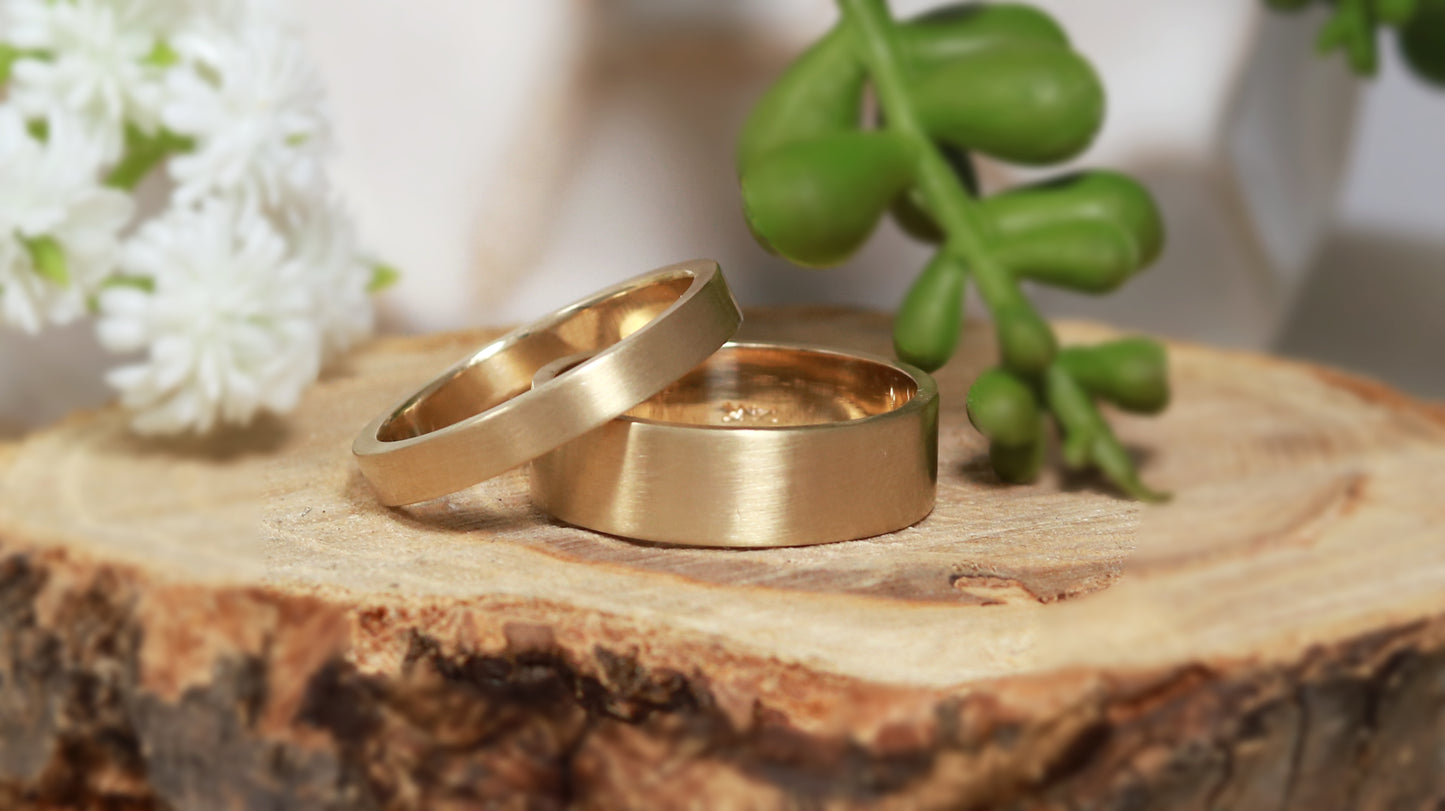 Solid 14k gold ring, 6mm wide, 1.75mm thick, matte finish outside, polished inside. Great wedding band.