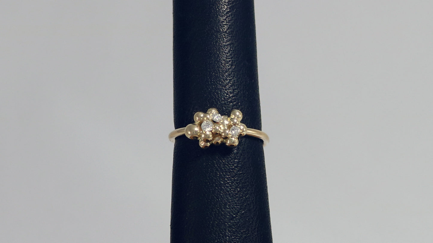 14k yellow gold bubble cluster ring with three 2mm white diamonds.
