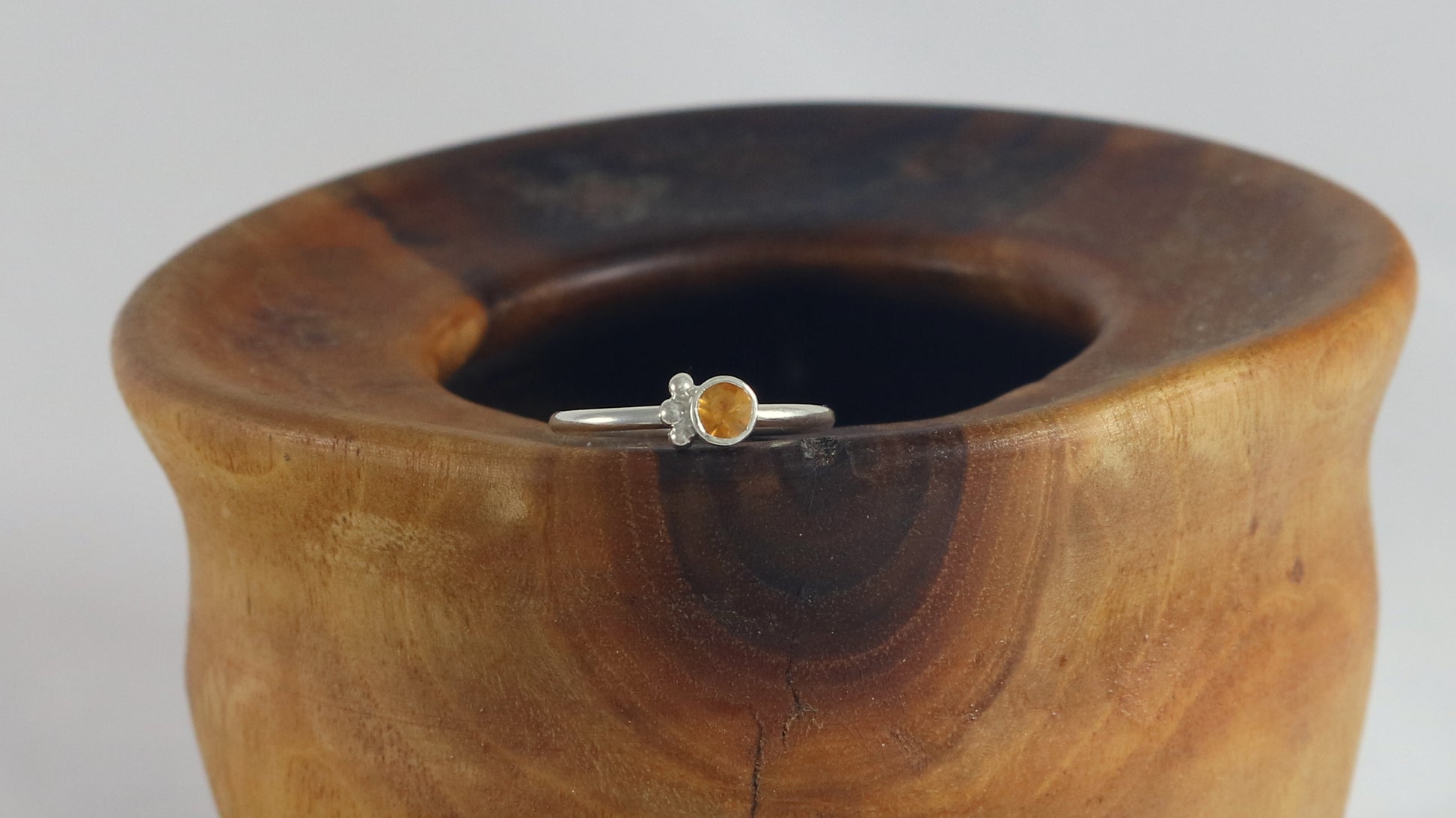 Natural gemstone set in sterling silver bezel, 3 silver bubble accents along bezel on sterling silver ring band.