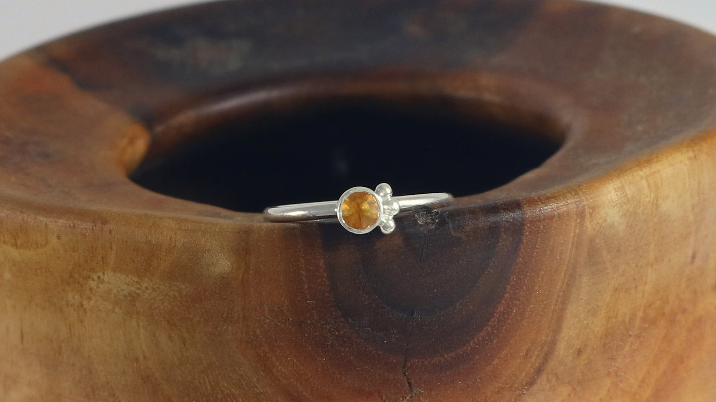 Natural gemstone set in sterling silver bezel, 3 silver bubble accents along bezel on sterling silver ring band.