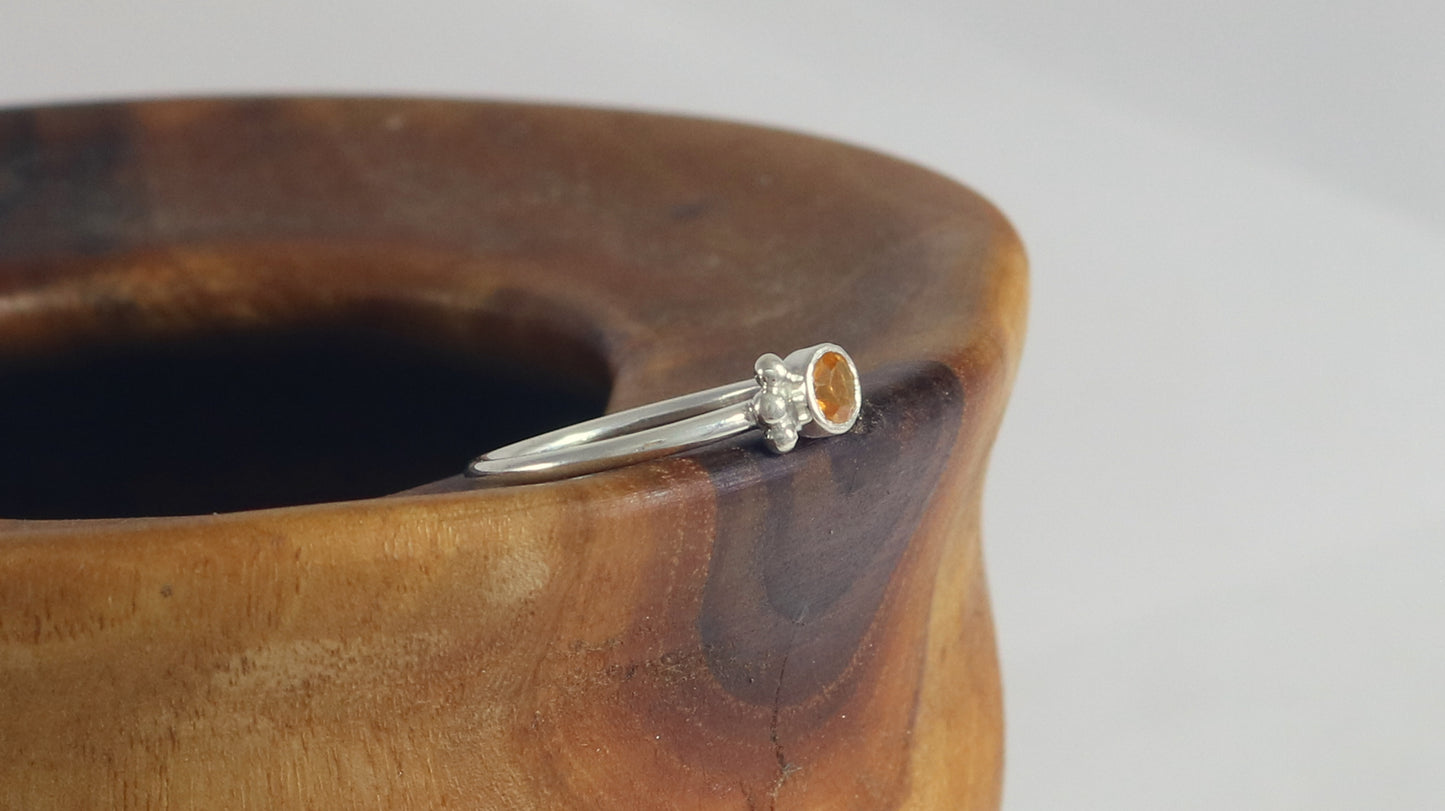 Natural gemstone set in sterling silver bezel, 3 silver bubble accents along bezel on sterling silver ring band.