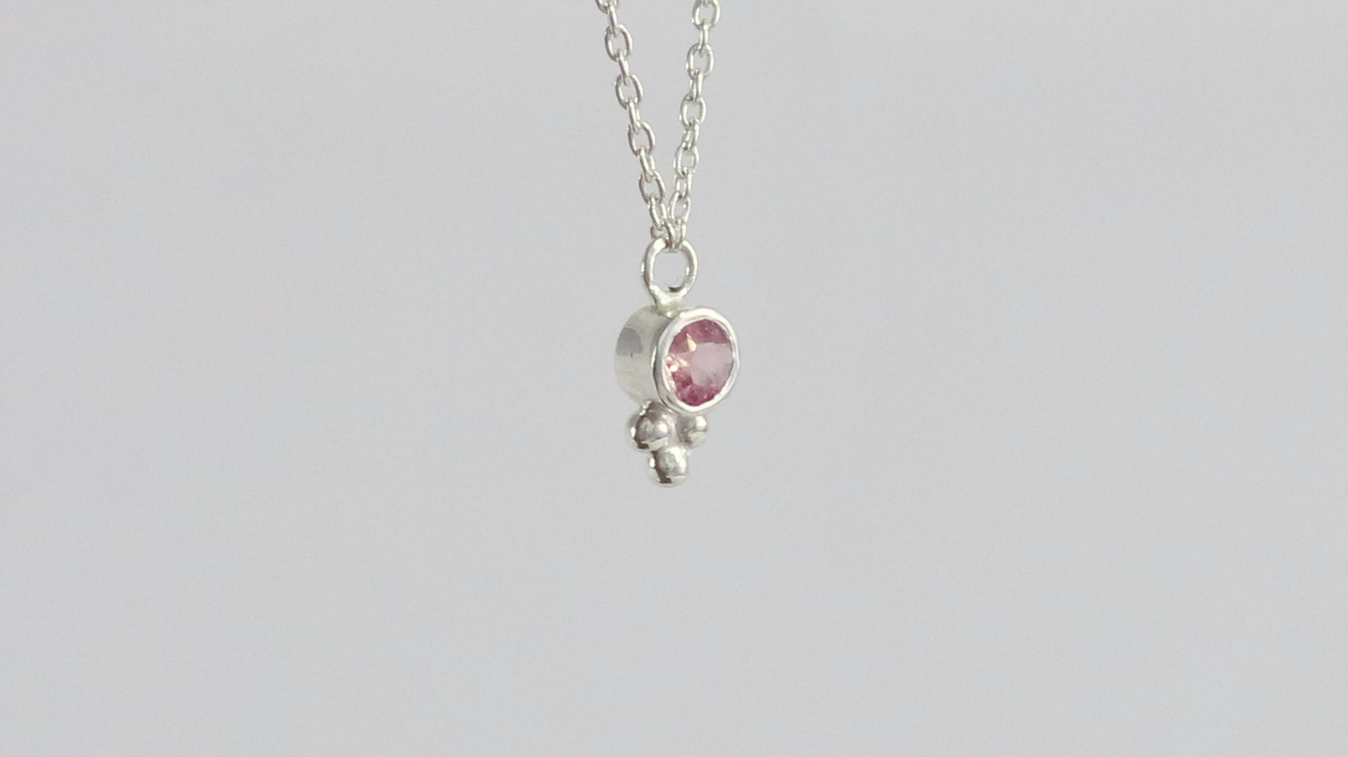 Natural gemstone set in sterling silver bezel, silver bubble pyramid accent on a sterling silver chain.