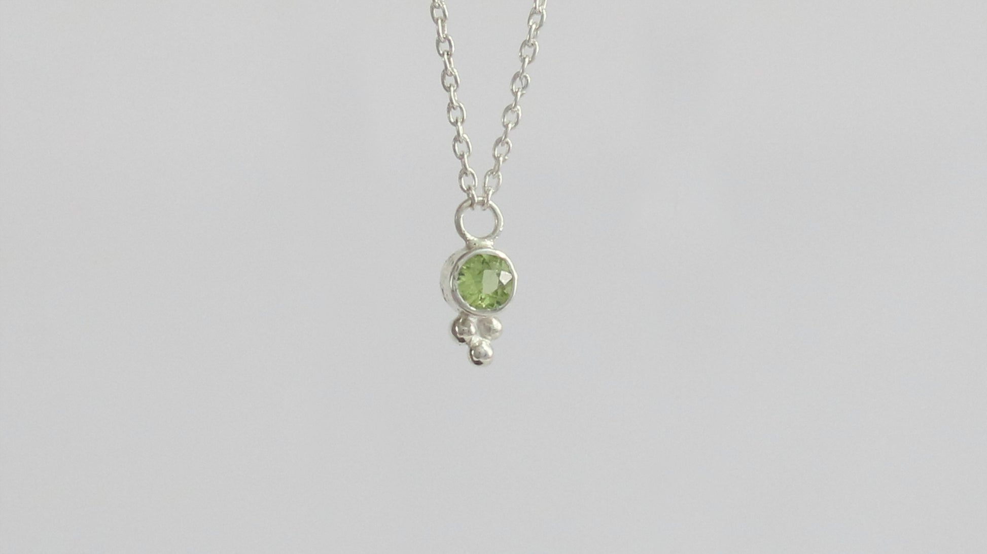 Natural gemstone set in sterling silver bezel, silver bubble pyramid accent on a sterling silver chain.