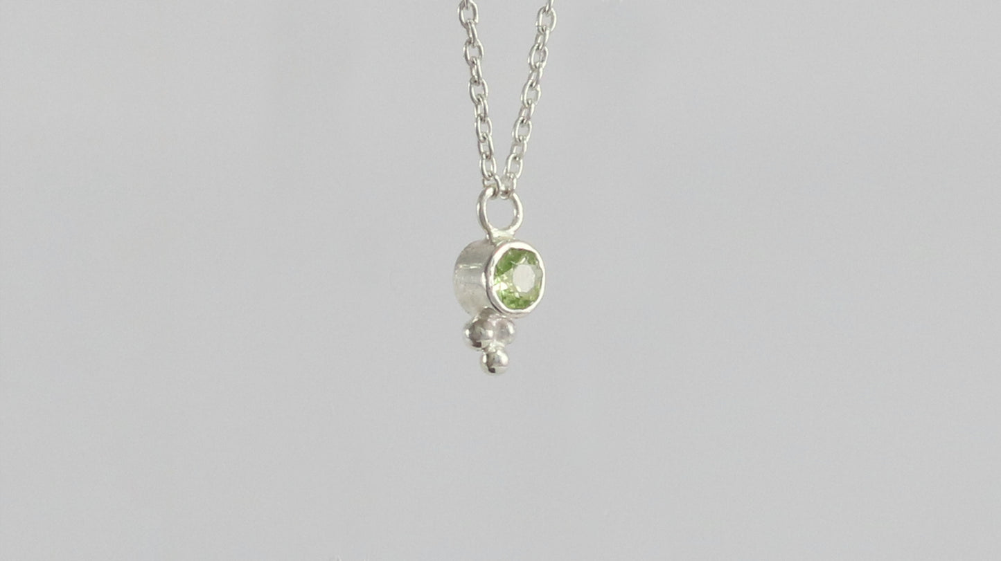 Natural gemstone set in sterling silver bezel, silver bubble pyramid accent on a sterling silver chain.