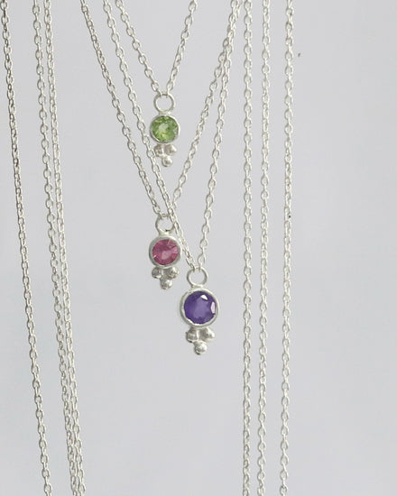 Natural gemstone set in sterling silver bezel, silver bubble pyramid accent on a sterling silver chain.