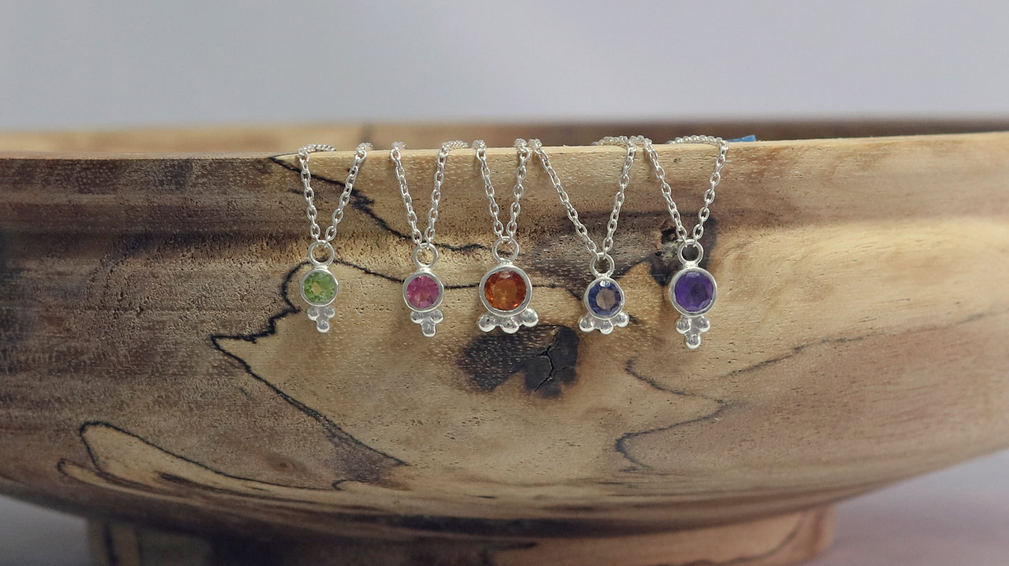 Natural gemstone set in sterling silver bezel, silver bubble pyramid accent on a sterling silver chain.