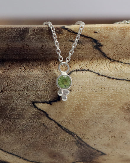 Natural gemstone set in sterling silver bezel, silver bubble pyramid accent on a sterling silver chain.