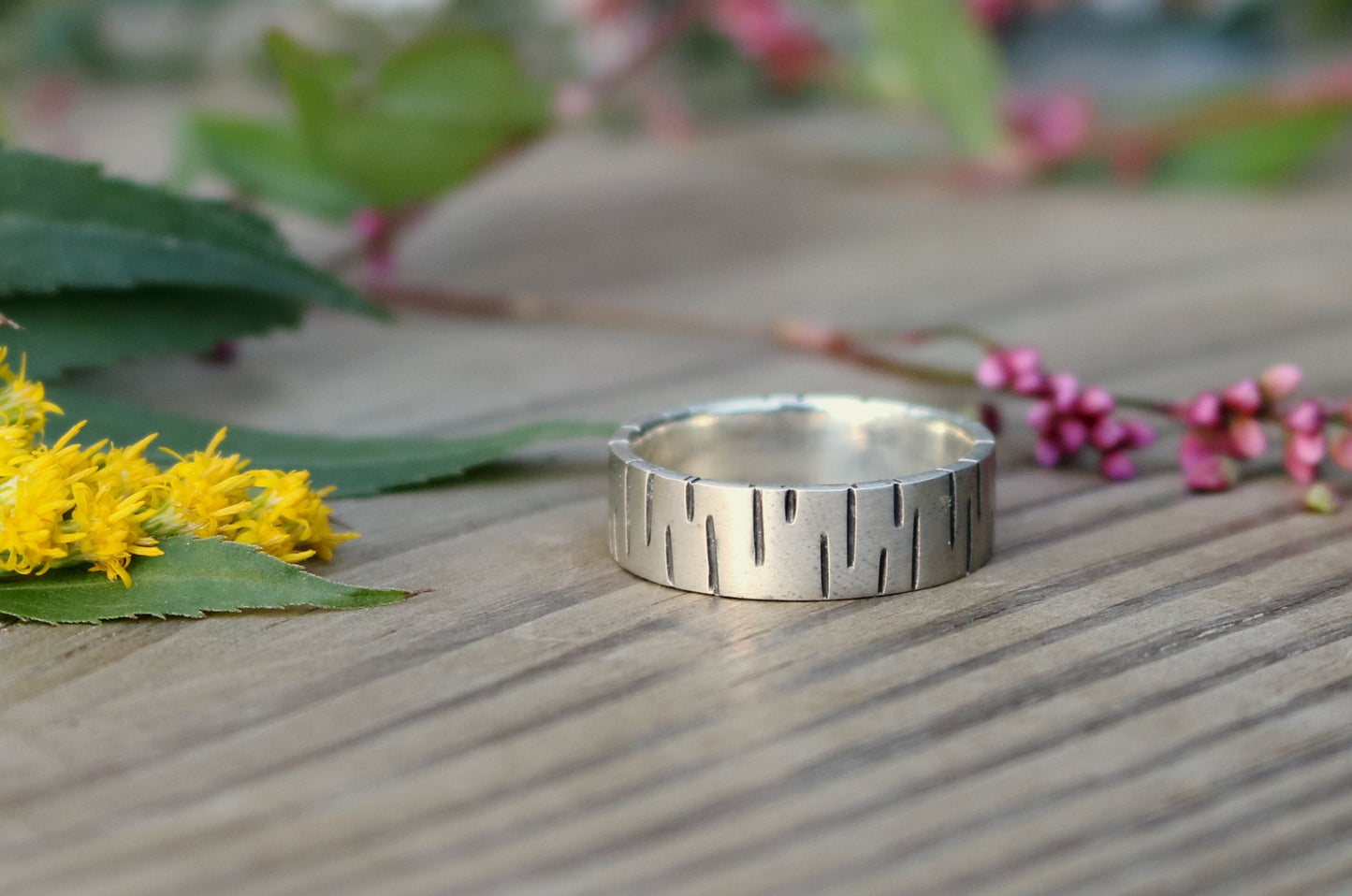 6mm sterling silver ring band with offset, randomly spaced, black lines.