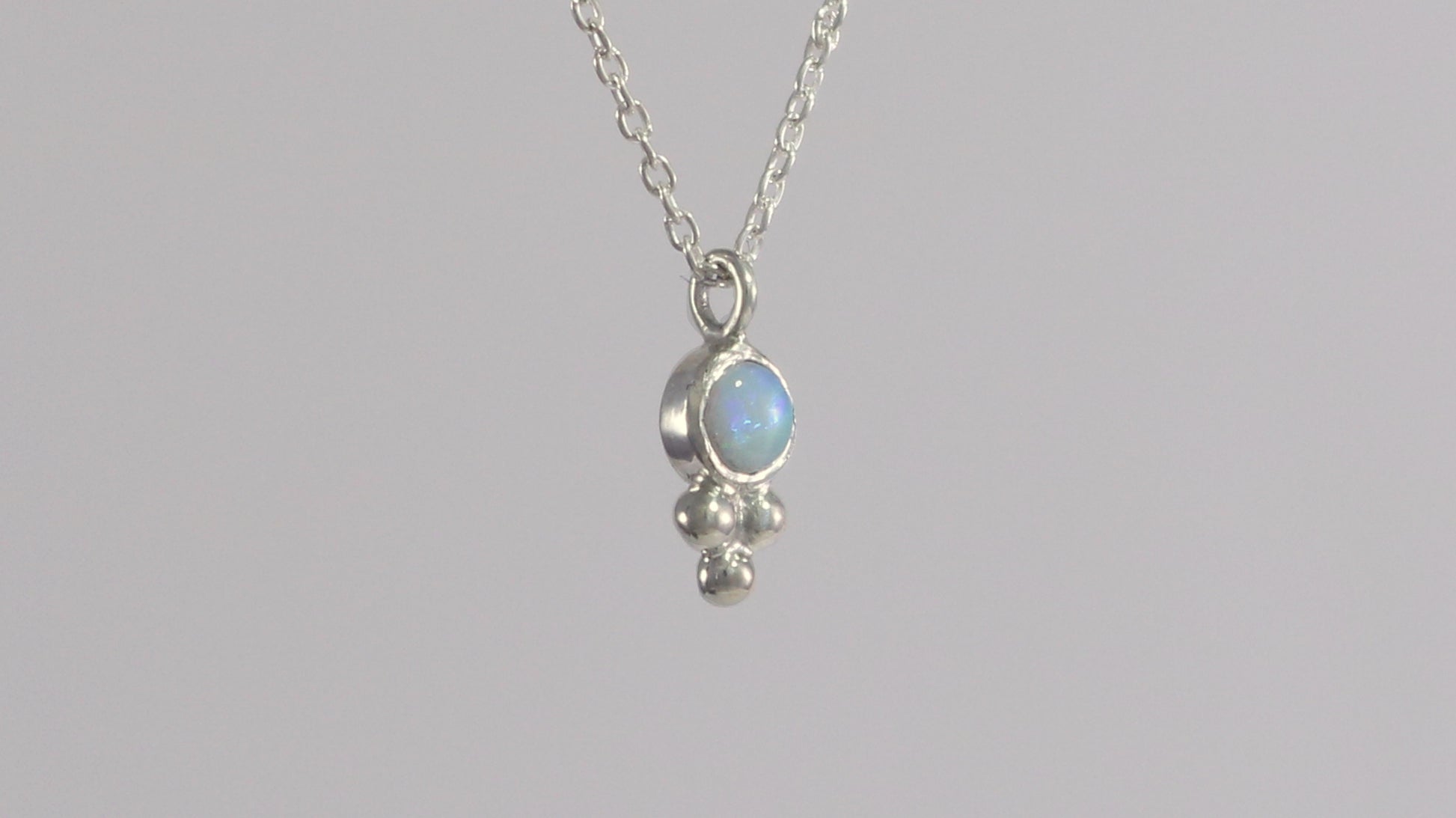 Natural gemstone set in sterling silver bezel, silver bubble pyramid accent on a sterling silver chain.