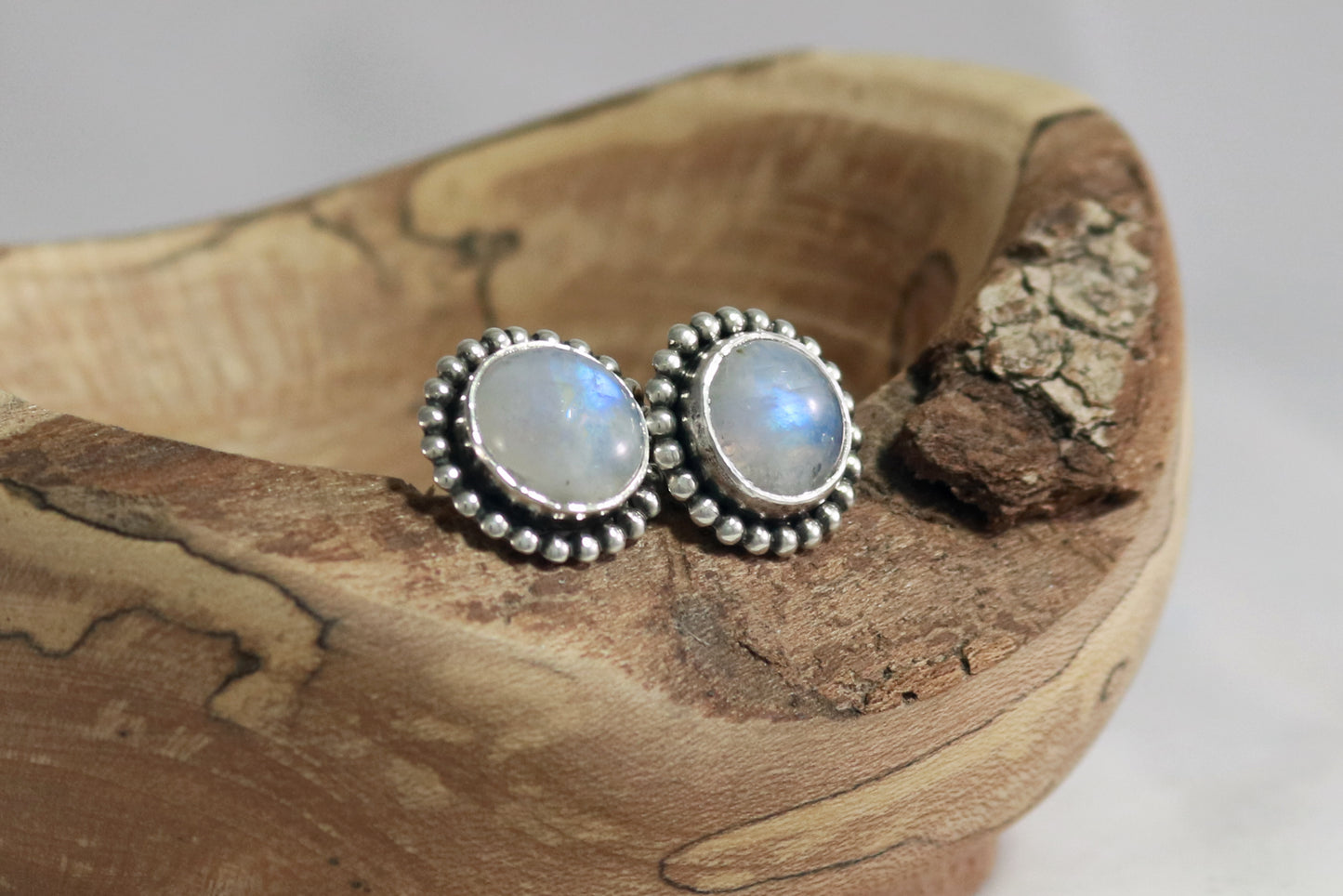 Natural rainbow moonstone stud earrings, sterling silver bezel, bubble halo.