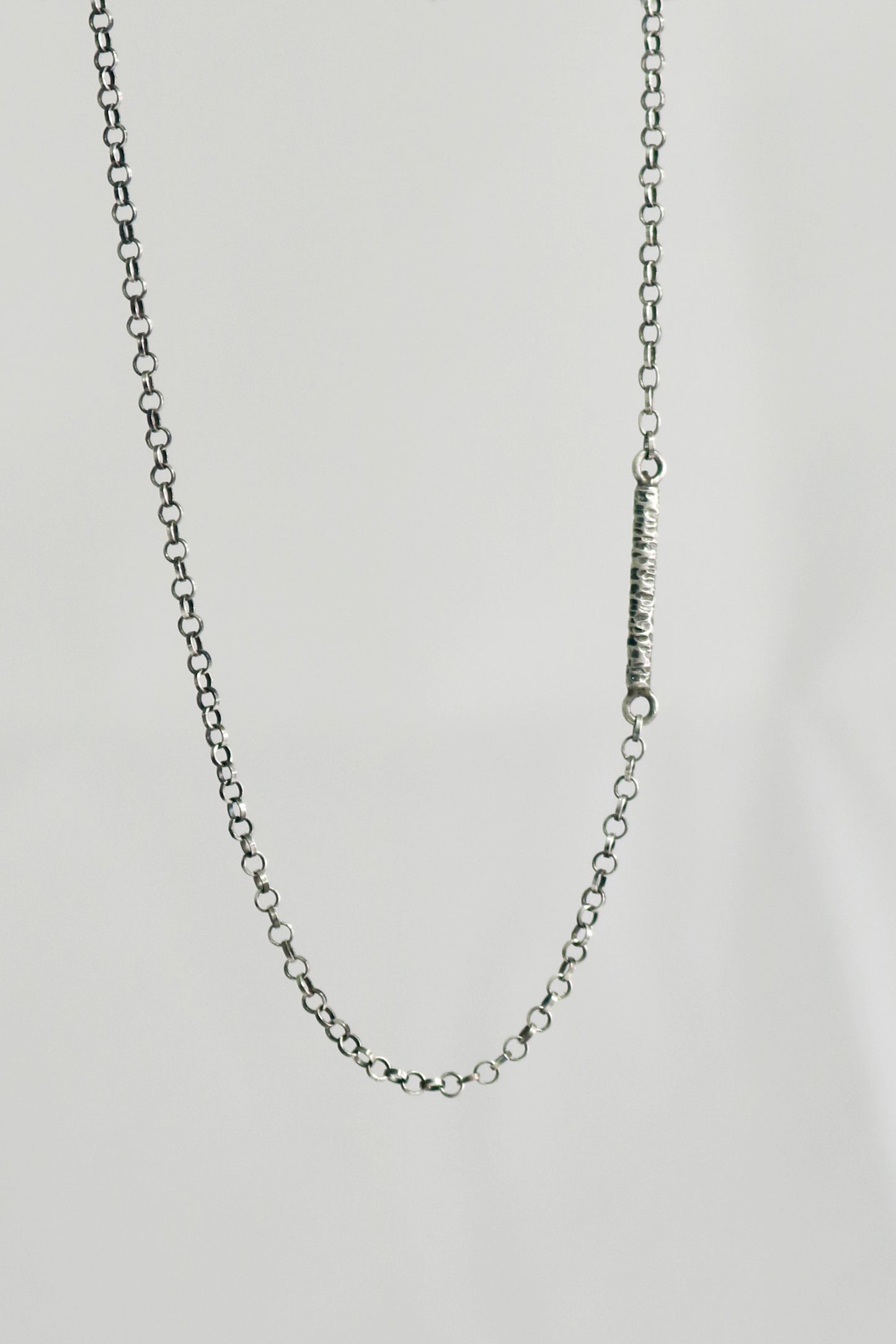 Solid sterling silver chain with a textured 15mm silver bar.
