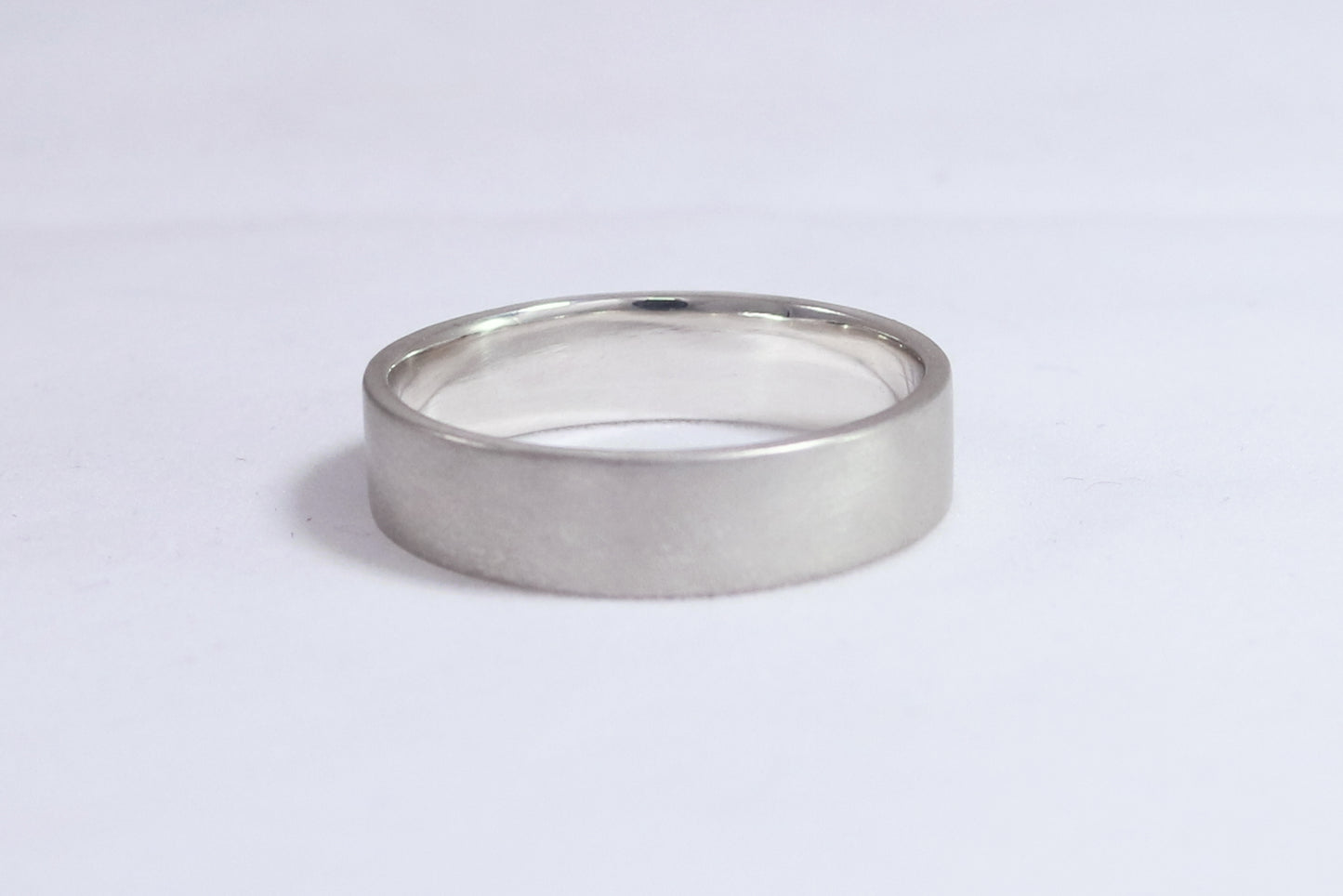 A sterling silver ring band with a matte finish outside & polished finish inside, 6mm wide, 1.7mm thick.