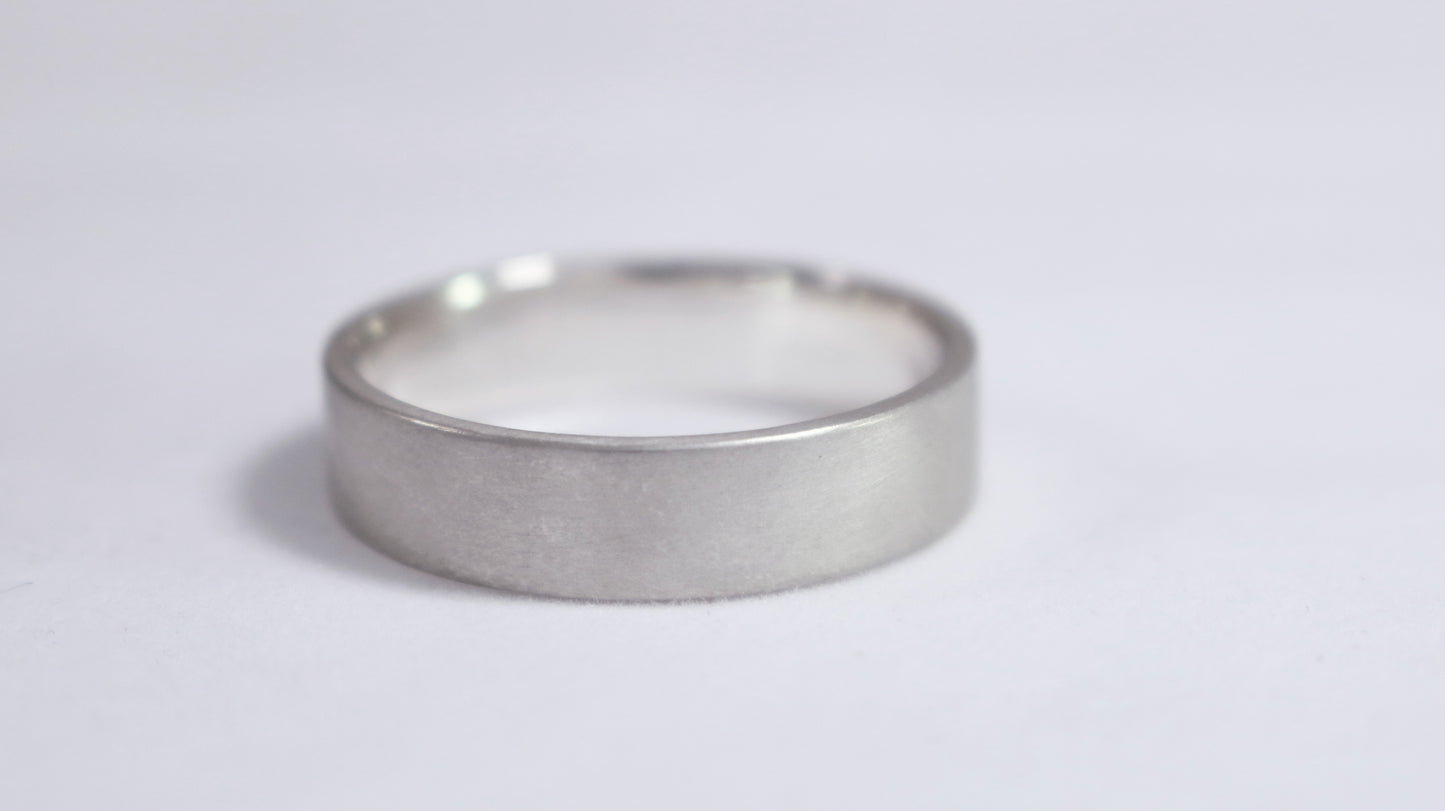 A sterling silver ring band with a matte finish outside & polished finish inside, 6mm wide, 1.7mm thick.