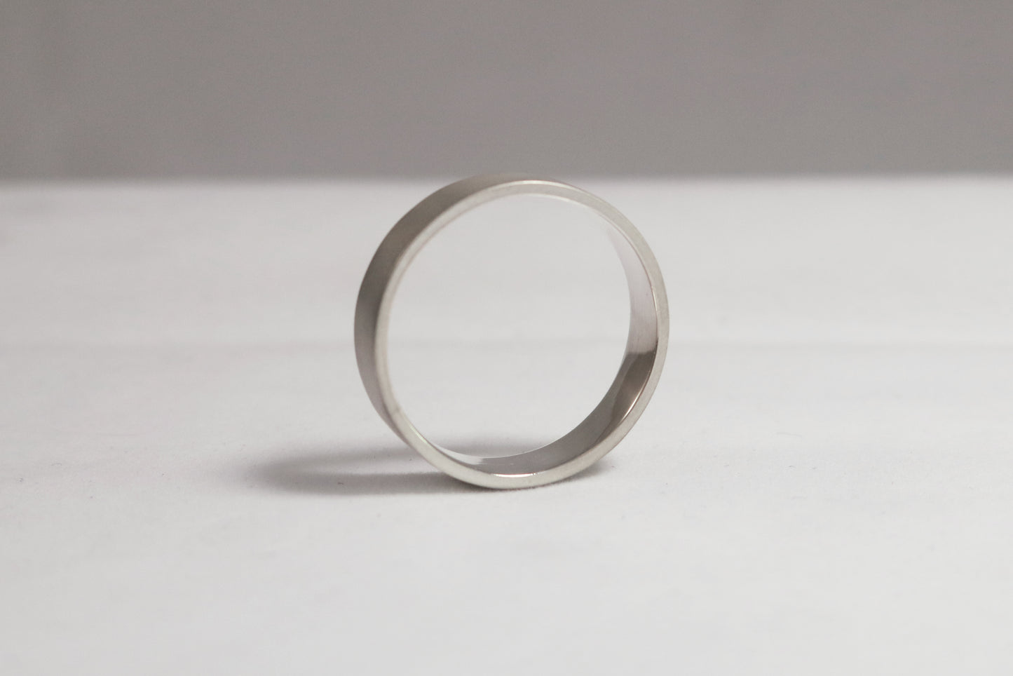 A sterling silver ring band with a matte finish outside & polished finish inside, 6mm wide, 1.7mm thick.