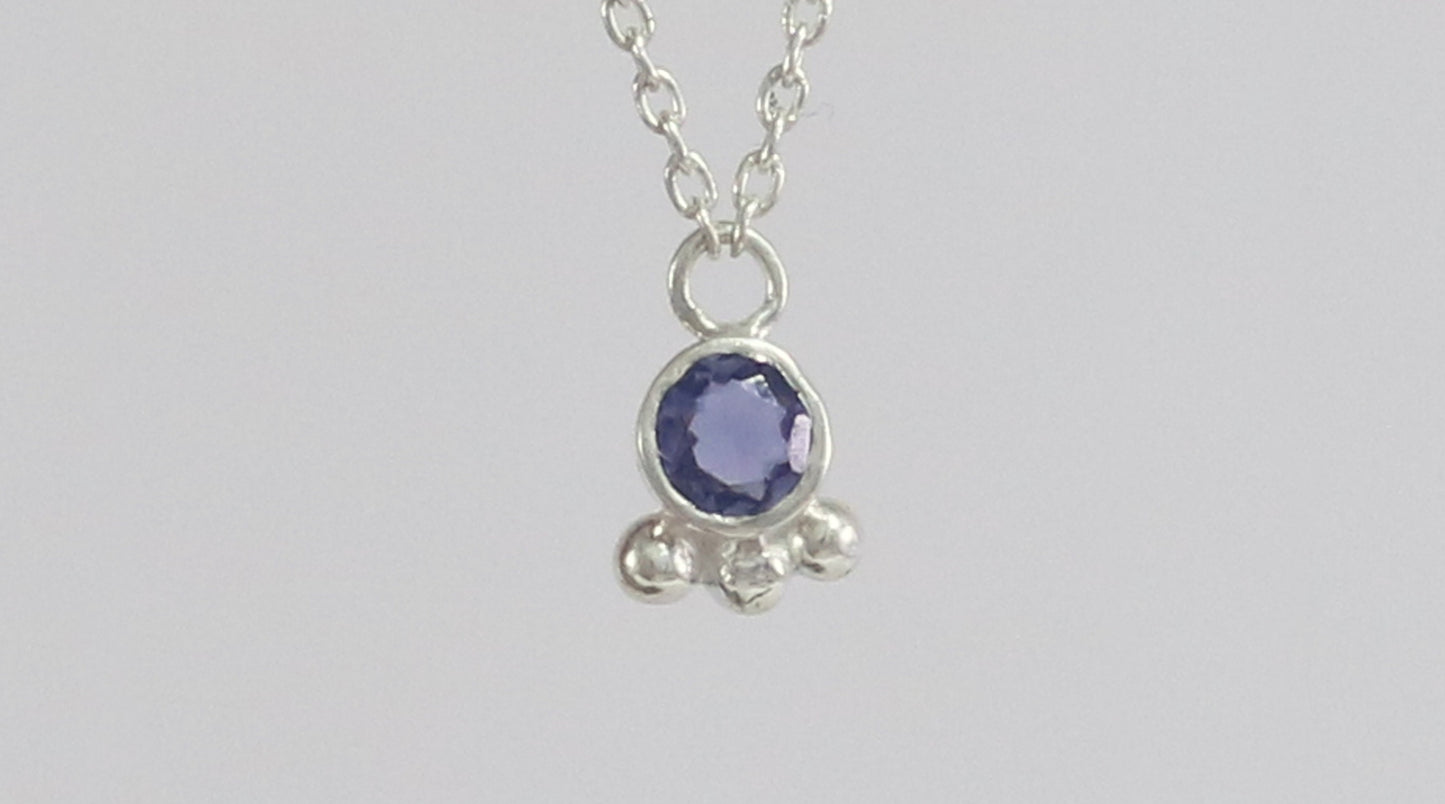 Natural gemstone set in sterling silver bezel with 3 silver bubble accents on a sterling silver chain.