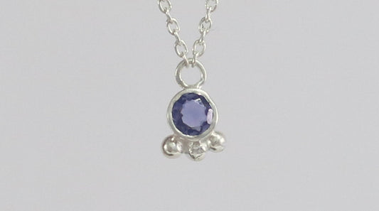 Natural gemstone set in sterling silver bezel with 3 silver bubble accents on a sterling silver chain.