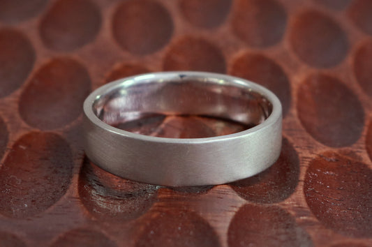 A sterling silver ring band with a matte finish outside & polished finish inside, 6mm wide, 1.7mm thick.