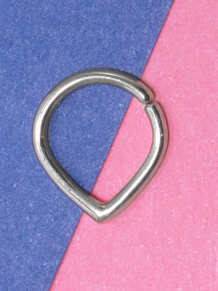 A sterling silver hoop with an opening at the top and a pointed base. To be worn as body jewelry