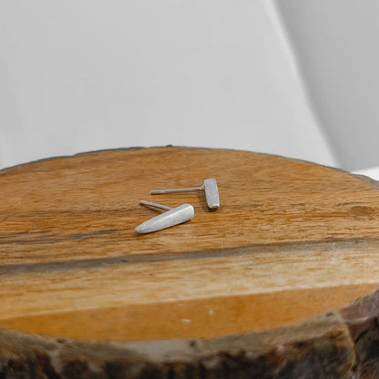 Sterling silver stud earrings shaped like spikes.