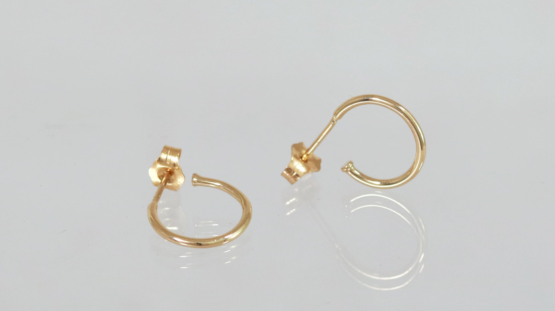 Solid 14k gold polished hoop earrings, huggie earrings.