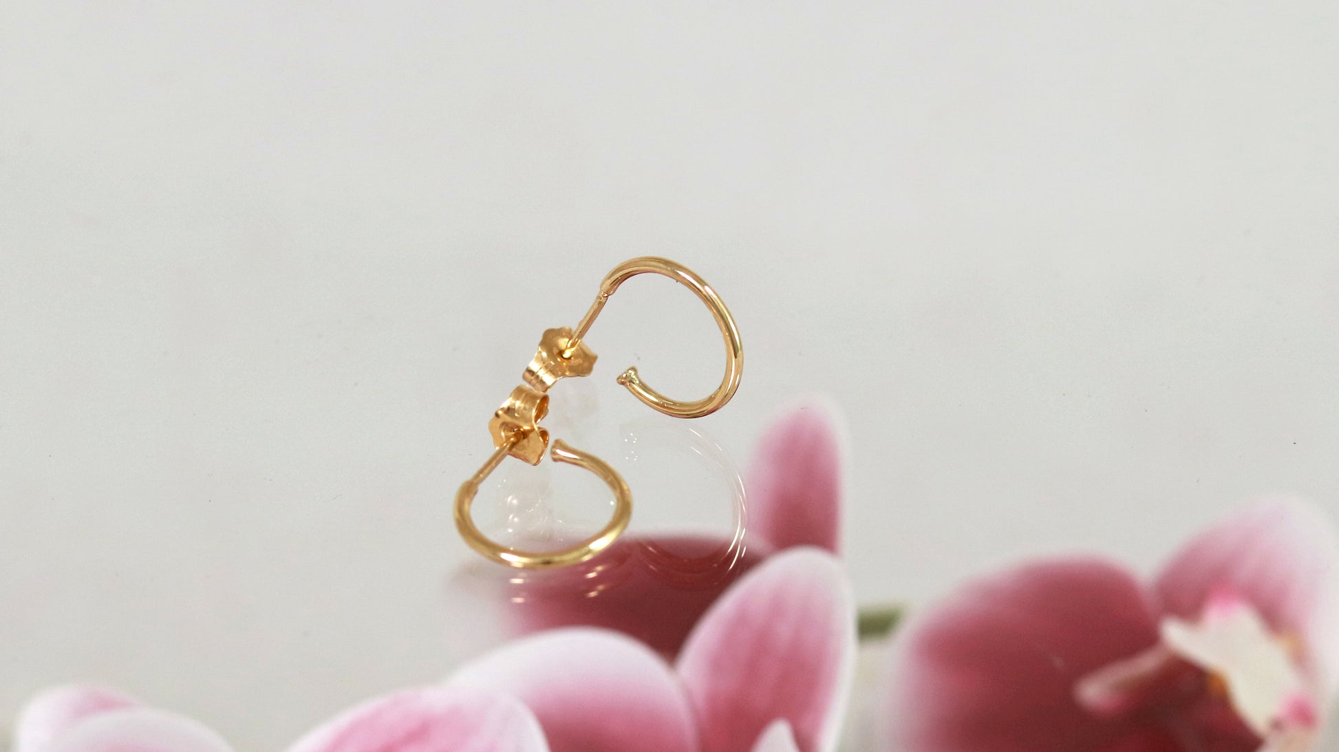 Solid 14k gold polished hoop earrings, huggie earrings.