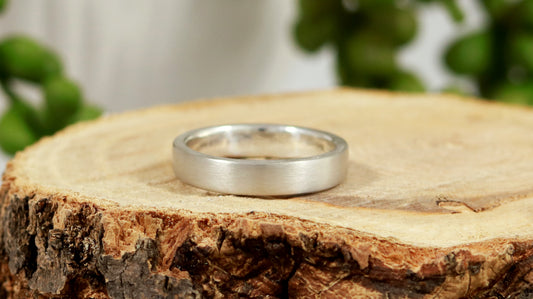 A sterling silver ring band with a matte finish outside & polished finish inside, 4mm wide, 1.7mm thick.