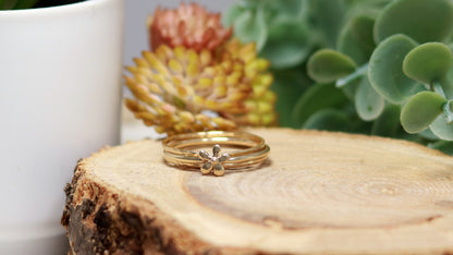 14k Yellow gold flower stacking ring.