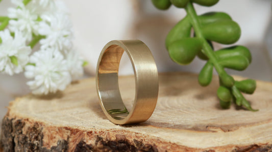 Solid 14k gold ring, 6mm wide, 1.75mm thick, matte finish outside, polished inside. Great wedding band.