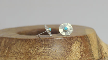 Sterling silver disc stud earrings with a natural round gemstone that has sunburst lines.