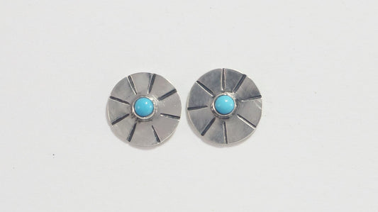 Sterling silver disc stud earrings with a natural round gemstone that has sunburst lines.