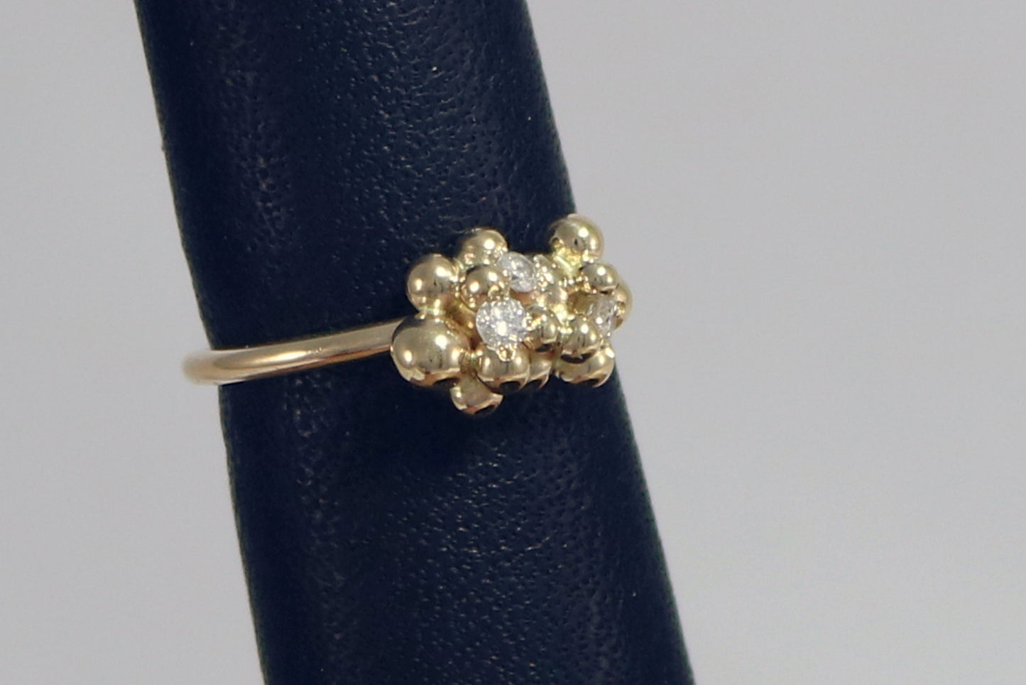 14k yellow gold bubble cluster ring with three 2mm white diamonds.