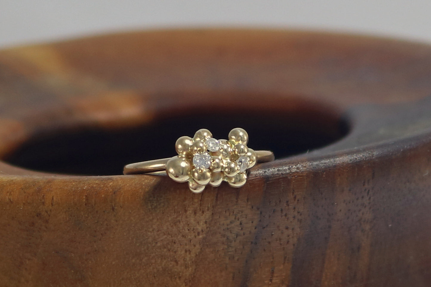 14k yellow gold bubble cluster ring with three 2mm white diamonds.