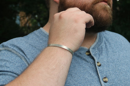 6mm sterling silver cuff, unisex, with a soft hammer texture.