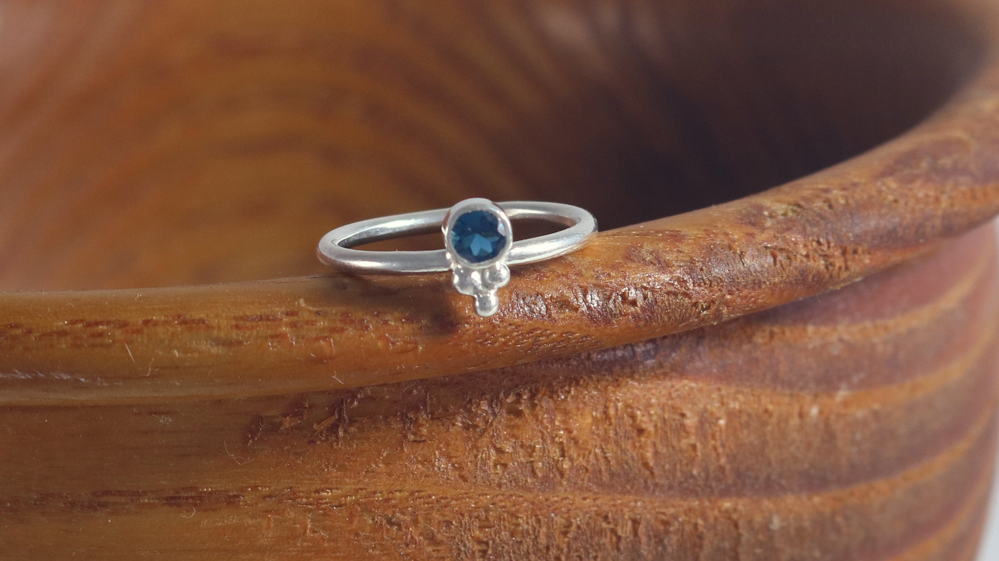 Natural gemstone set in sterling silver bezel, silver bubble pyramid accents on sterling silver ring band.