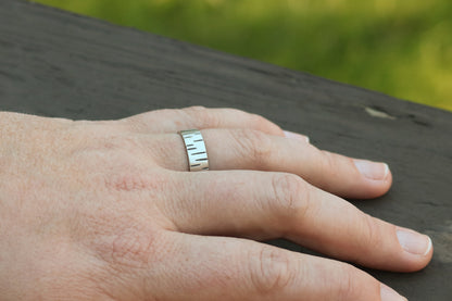 6mm sterling silver ring band with offset, randomly spaced, black lines.