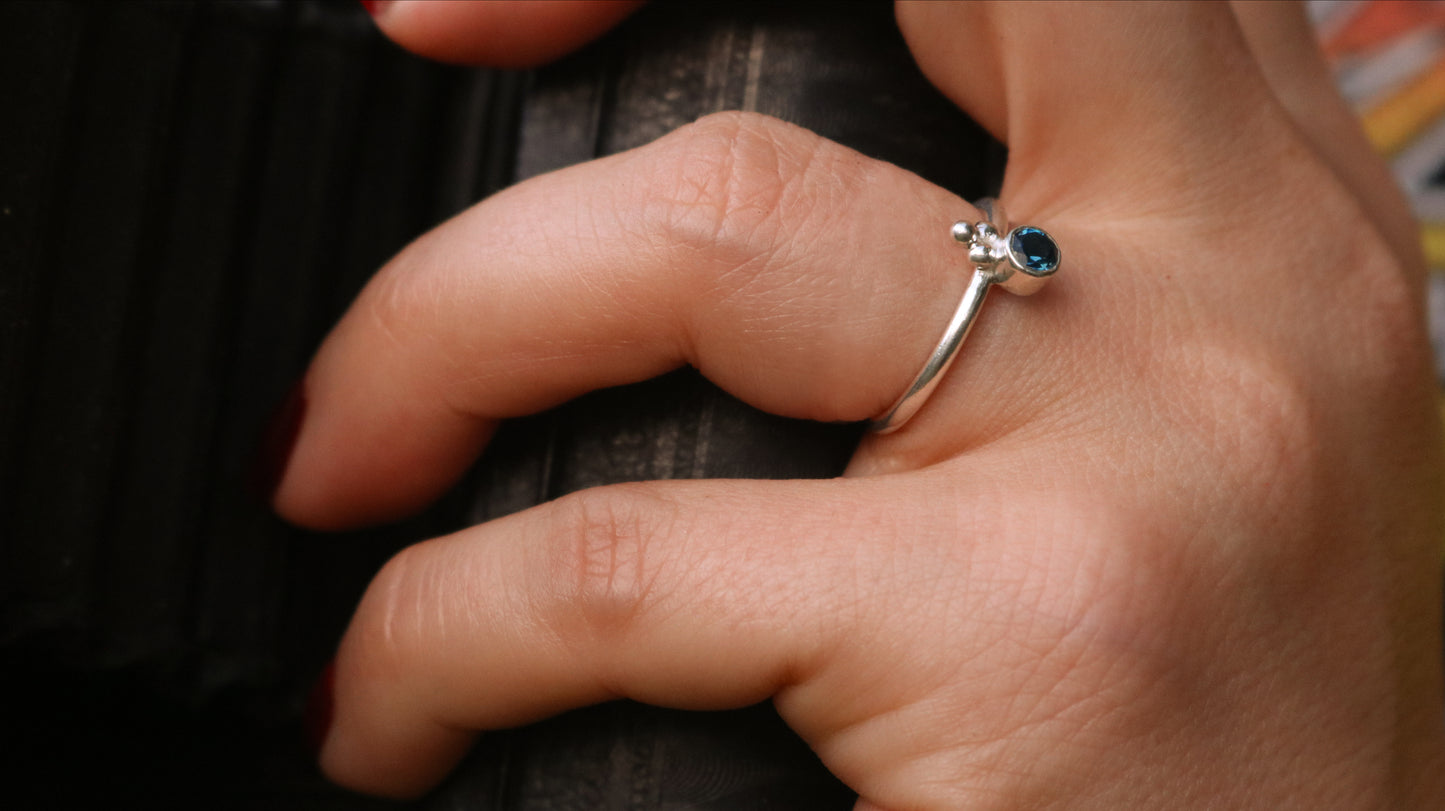 Natural gemstone set in sterling silver bezel, silver bubble pyramid accents on sterling silver ring band.