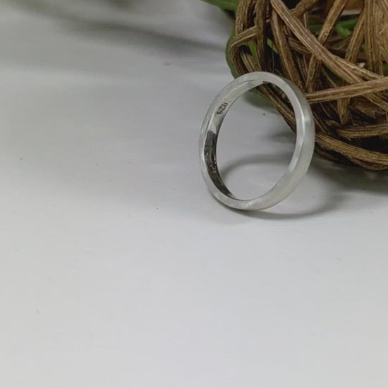 A video of a sterling silver ring band with a matte finish outside & polished finish inside, 3mm wide, 1.7mm thick.