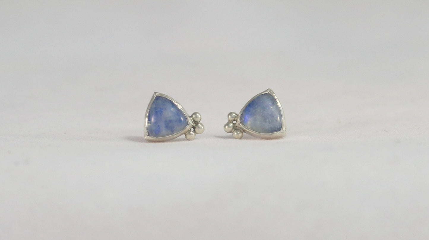 Natural trillion gemstones set in sterling silver bezel with 3 silver bubble accents, stud earrings.