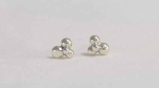 Stud earrings with a stylish cute cluster of 4 sterling silver bubbles.