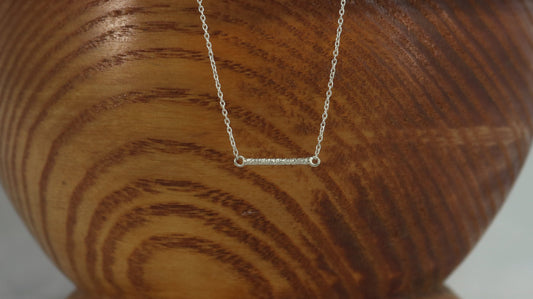 Solid sterling silver chain with a textured 15mm silver bar. 